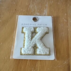 Kappa—Gold and White Adhesive Patch